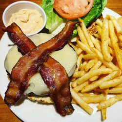 The Grouse House - Thursday night special- Burger & Brew $16. Additional toppings: apple cider bacon, onion jam and favorite cheese.