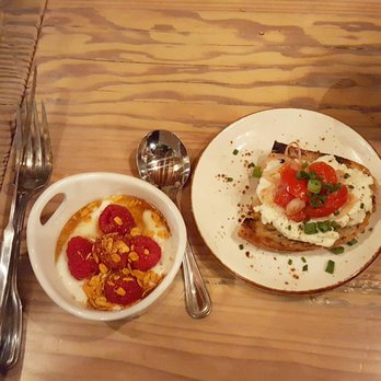 Lechon - First 2 courses from chef menu for brunch. A fruit parfait w/raspberries & housemade granola & toast with ricotta & roasted tomatoes. - Tapas Bars Near Me - Portland, Oregon