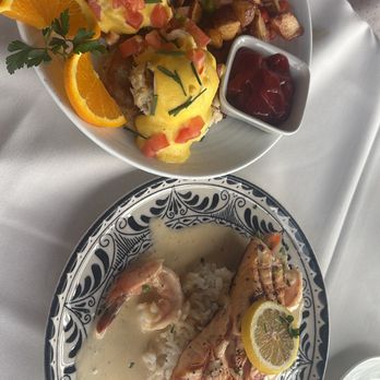 Rusty Pelican - Crab Cake Benedict and Salmon with Lobster Sauce - Seafood Near Me - Newport Beach, California Rusty Pelican - Crab Cake Benedict and Salmon with Lobster Sauce - Seafood Near Me - Newport Beach, California