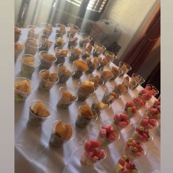 The Taco Lady - Guacamole and chips appetizers on one side and fresh cut fruit cups on the other . This request was made from our clients wedding . - Caterers Near Me The Taco Lady - Guacamole and chips appetizers on one side and fresh cut fruit cups on the other . This request was made from our clients wedding . - Caterers Near Me