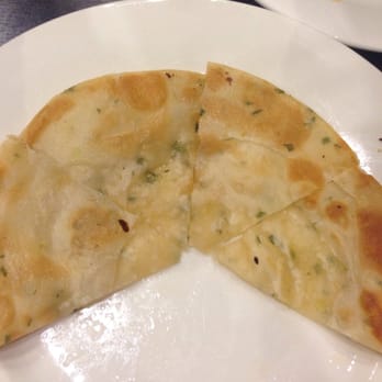 Super Juicy Dumplings - Partially eaten green onion pancake! - Dim Sum Near Me - Brea, California Super Juicy Dumplings - Partially eaten green onion pancake! - Dim Sum Near Me - Brea, California