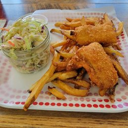 Fried Halibut platter with coleslaw and French fries.