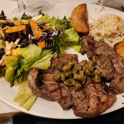 Gigot d'neau, Greek potatoes, rice, salad. Excellent flavors.