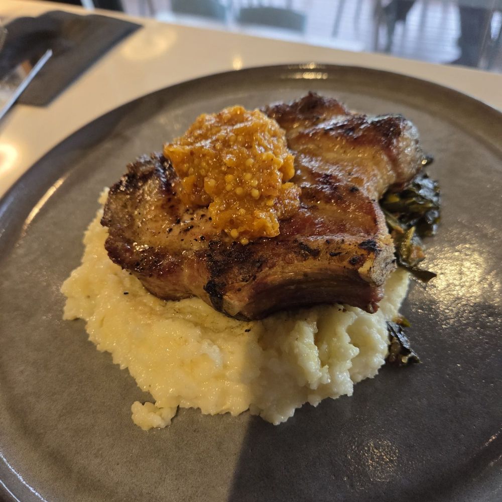 Sweet Waters on the River - Kurobta Pork with Grits - American Near Me - Eugene, Oregon Sweet Waters on the River - Kurobta Pork with Grits - American Near Me - Eugene, Oregon
