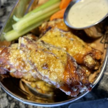 Topgolf - a bowl of chicken wings, carrots and celery - Golf Near Me - Germantown, Maryland Topgolf - a bowl of chicken wings, carrots and celery - Golf Near Me - Germantown, Maryland