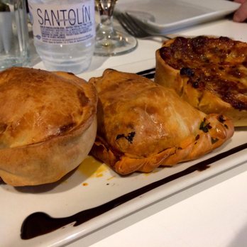 Tinto y Tapas - Empanadas (left to right): Ham and Cheese, Meat, Onion and Cheese - Tapas Bars Near Me - Madrid, M Tinto y Tapas - Empanadas (left to right): Ham and Cheese, Meat, Onion and Cheese - Tapas Bars Near Me - Madrid, M