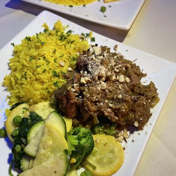 Cafe Soriah - Lamb Tagine split between two plates - Mediterranean Near Me - Eugene, Oregon