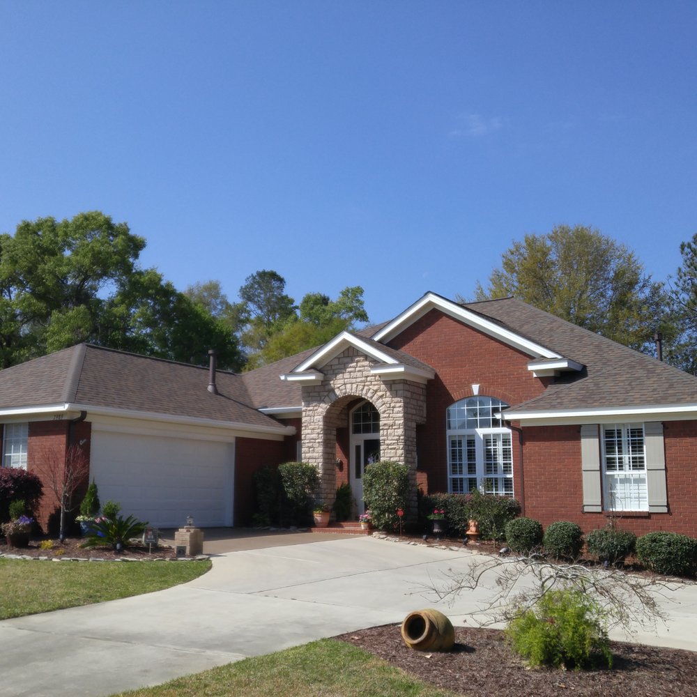 Slide of Tadlock Roofing