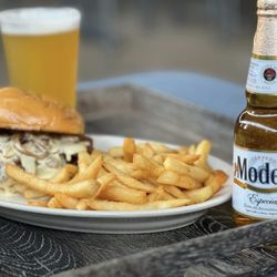 Rockefeller's Grille - Wednesday lunch special Brie burger with fries.
