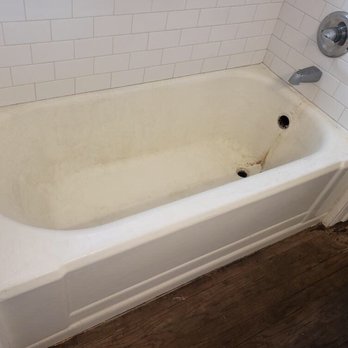 ABC Resurfacing - 3-4 layers of previous glaze. The tub is clean. Just stained and glaze chipped and rusted. Another company reglazed it a year ago. - Kitchen & Bath Near Me - Tucson, Arizona