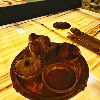 Bagheera - Pakoras ($16) Coconut meatballs ($18) side basmati rice($4) and sauce. - Cocktail Bars Near Me - Vancouver, British Columbia Bagheera - Pakoras ($16) Coconut meatballs ($18) side basmati rice($4) and sauce. - Cocktail Bars Near Me - Vancouver, British Columbia
