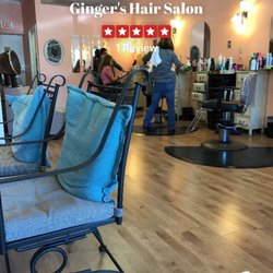 Dipu Patel at Ginger's Hair Salon - This is the inside of the salon - Dipu is in the back chair doing the threading.