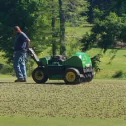 Jackson Golf Association - Aerating the greens.