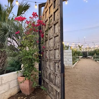 Escuela - Garden gate - Tex-Mex Near Me - Austin, Texas Escuela - Garden gate - Tex-Mex Near Me - Austin, Texas