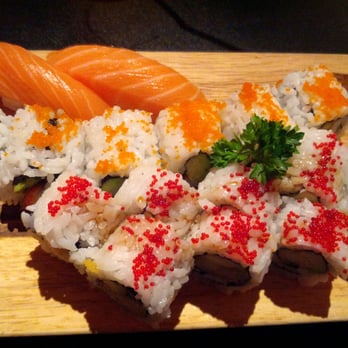 Sushi Umi - a variety of sushi on a wooden board - Sushi Bars Near Me - Ottawa, Ontario Sushi Umi - a variety of sushi on a wooden board - Sushi Bars Near Me - Ottawa, Ontario