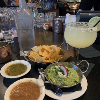 Cha Cha's Latin Kitchen - Fresh Guacamole and their house chips and salsa, featuring their grande classic margarita - Bars Near Me - Brea, California Cha Cha's Latin Kitchen - Fresh Guacamole and their house chips and salsa, featuring their grande classic margarita - Bars Near Me - Brea, California