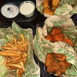Complimentary 8 piece combo with a side of fries that I purchased. Everything well seasoned. Complimentary 8 piece combo with a side of fries that I purchased. Everything well seasoned.