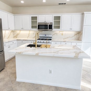 Simplified Home Remodeling - Kitchen countertop--Calcatta Gold quartz - General Contractors Near Me