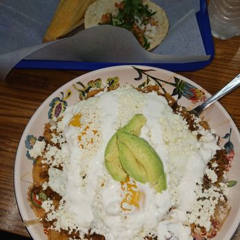 Tacos El Fluffy - Chiliquiles with eggs over easy, green sauce, and Carne asada. - Mexican Near Me - Pensacola, Florida