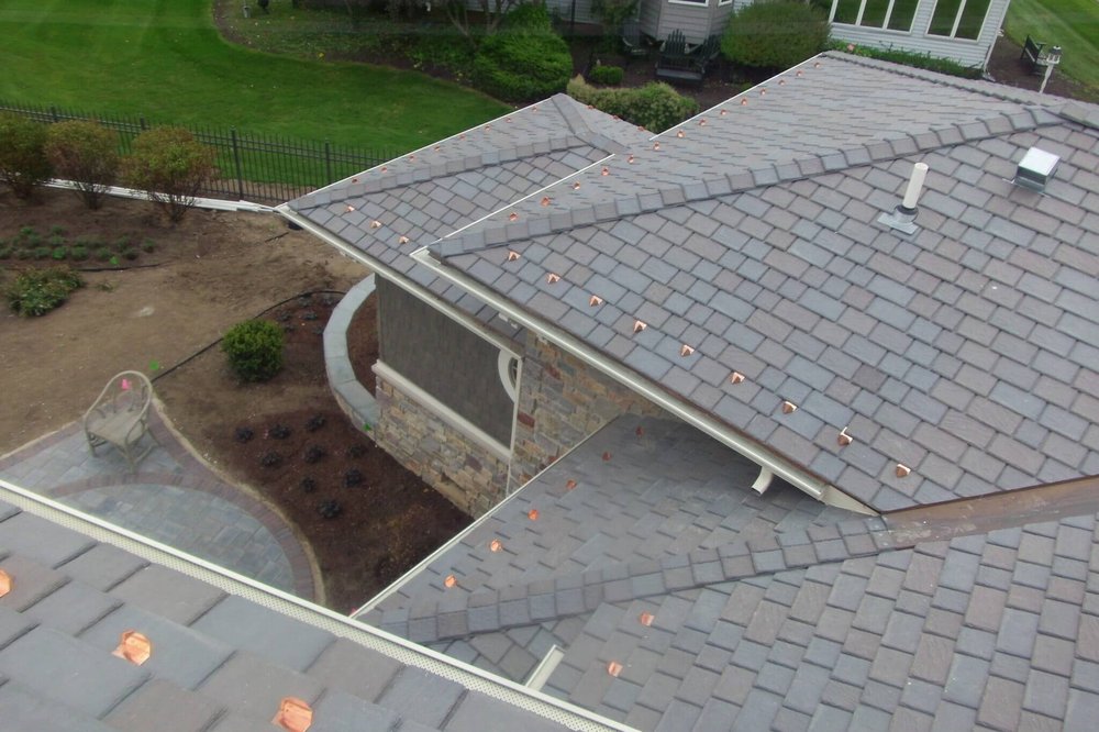 Slide of Dallas Roofing Company