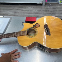 Uncle Dan's Pawn - Garland - Geetar