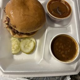 Large BBQ pork sandwich with baked beans Large BBQ pork sandwich with baked beans