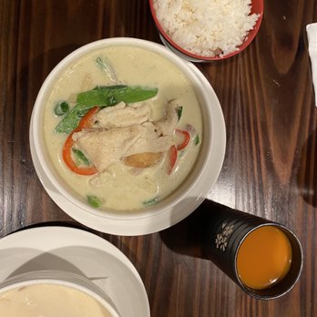 Spoon and Fork Asia Cuisine - Green Curry Chicken with cup of hot Thai Tea - Sushi Bars Near Me - Auburn, New York Spoon and Fork Asia Cuisine - Green Curry Chicken with cup of hot Thai Tea - Sushi Bars Near Me - Auburn, New York