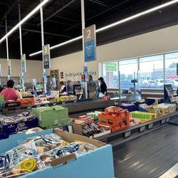 ALDI - No self check out here, unfortunately. But they have multiple cashiers at the checkouts.