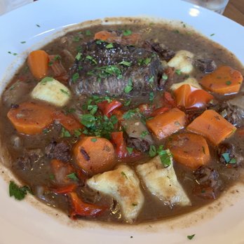 The Farish House - Peposo, a beef stew with a rich sauce and gnocchi. - Wine Bars Near Me - Phoenix, Arizona The Farish House - Peposo, a beef stew with a rich sauce and gnocchi. - Wine Bars Near Me - Phoenix, Arizona