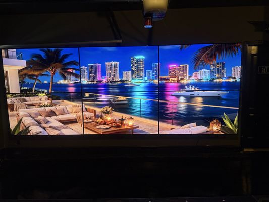 TV Mounting Service - We transformed this garage into the ultimate entertainment and hangout space with a custom 6 screen, 65' video wall spanning the entire  wall. the 6 displays create an impressive, immersive viewing experience that's perfect for watching multiple games, hosting guest, enjoying movies, or keeping up with several screens at once. Designed to maximize the space while making a bold visual statement, this video wall turns an ordinary garage into a premium entertainment destination.