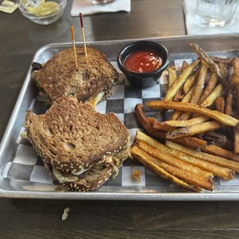 Welcome to the Oscar's Bistro - Pork Belly Rueben (Opps, took a few bites, too. - American Near Me - Montgomery, Texas