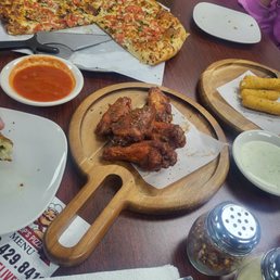 Mozzarella sticks, wings, Margherita pizza Mozzarella sticks, wings, Margherita pizza