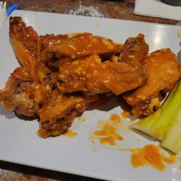 a plate of wings and celery a plate of wings and celery