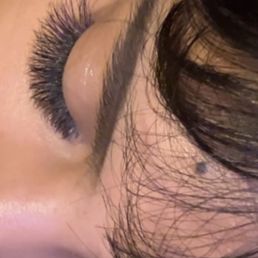 Eyelash extensions with purple accents