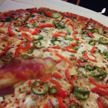 Villa Rosa Pizza Kitchen - Red peppers, red onions, sliced jalapeños, 1/2 sausage and 1/2 spinach with extra sauce. Thin crust. - Pizza Near Me - Chicago, Illinois