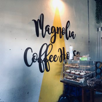 Magnolia House - a surfboard leaning against a wall - Coffee & Tea Near Me - Prairie Grove, Arkansas Magnolia House - a surfboard leaning against a wall - Coffee & Tea Near Me - Prairie Grove, Arkansas