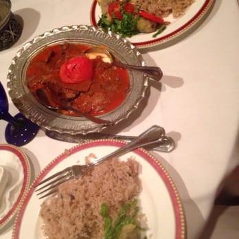 Turkish Kitchen - From top to bottom: traditional rice, lamb in spice and/ yogurt sauce with pita bread, and more rice with grape leaves. - Turkish Near Me - New York, New York Turkish Kitchen - From top to bottom: traditional rice, lamb in spice and/ yogurt sauce with pita bread, and more rice with grape leaves. - Turkish Near Me - New York, New York