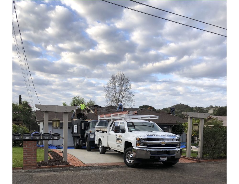 Slide of Sandoval Roofing