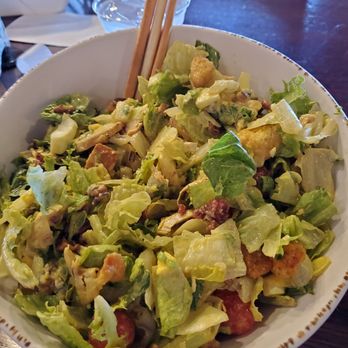 Newk's Eatery - a bowl of salad with chopsticks - Pizza Near Me - Tyler, Texas Newk's Eatery - a bowl of salad with chopsticks - Pizza Near Me - Tyler, Texas