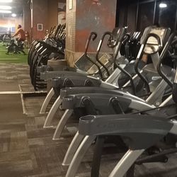 LA Fitness - Cardio, elliptical area. All 5 behind the pillar need of repair. Either loose, wobbly, unable to move or has a repair sign. Pathetic.