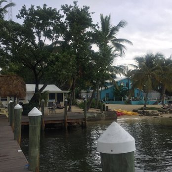 The Pelican Motel - Sail Away Suite from the deck to the left. Private beach area with kayaks - Venues & Event Spaces Near Me - Key Largo, Florida The Pelican Motel - Sail Away Suite from the deck to the left. Private beach area with kayaks - Venues & Event Spaces Near Me - Key Largo, Florida