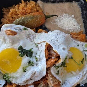 Tacos El Jimador - Chilaquiles w/ red sauce and sunny side up eggs - Tacos Near Me - Fontana, California Tacos El Jimador - Chilaquiles w/ red sauce and sunny side up eggs - Tacos Near Me - Fontana, California