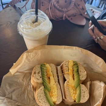Kona Coffee District - Vanilla Frappe & Egg, Cheese, + Avocado Bagel - Coffee & Tea Near Me - Lake Forest, California Kona Coffee District - Vanilla Frappe & Egg, Cheese, + Avocado Bagel - Coffee & Tea Near Me - Lake Forest, California