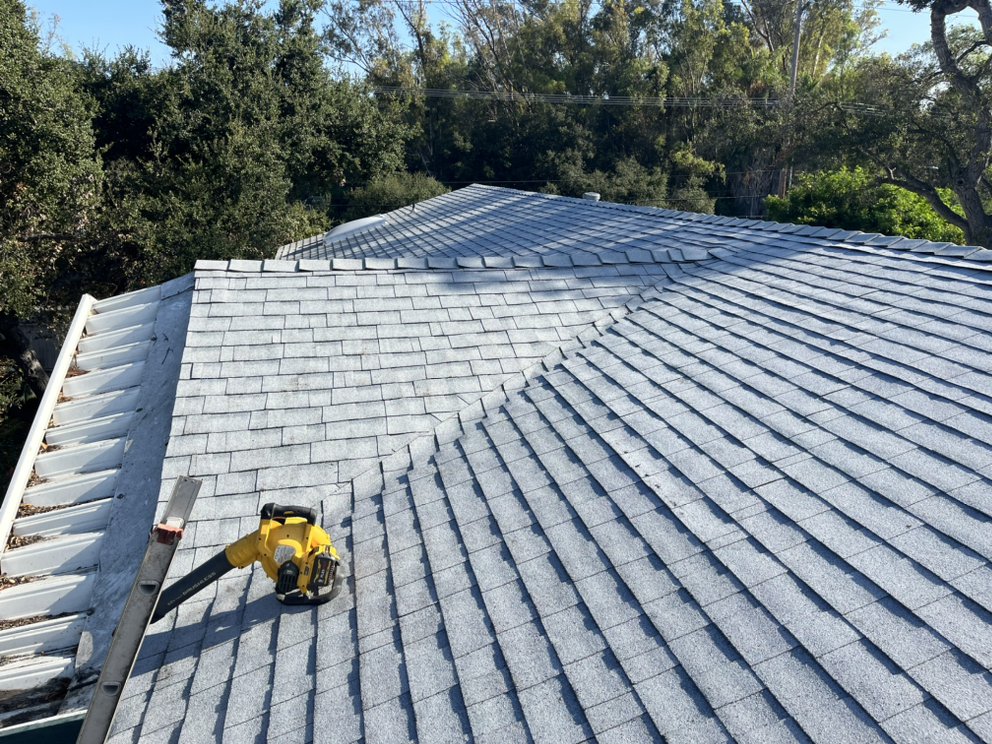 Slide of The Roofing Company