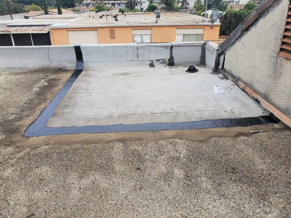 Slide of Berber-Bravo Roofing