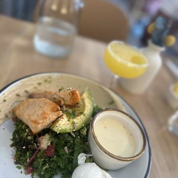Two Hands - My chopped kale/brussel/avo salad topped with salmon & crazyyyyyy-good dressing - Cafes Near Me - New York, New York Two Hands - My chopped kale/brussel/avo salad topped with salmon & crazyyyyyy-good dressing - Cafes Near Me - New York, New York