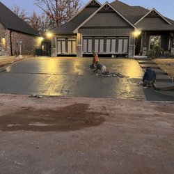 VM Concrete - Tailored to perfection. A custom driveway design that adds character and curb appeal to a new home.