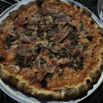 Tony's Pizzeria Teatro - The favorite so delicious more of a tomato type pie with prosciutto, olives and mushrooms so delicious - Italian Near Me - Boise, Idaho Tony's Pizzeria Teatro - The favorite so delicious more of a tomato type pie with prosciutto, olives and mushrooms so delicious - Italian Near Me - Boise, Idaho