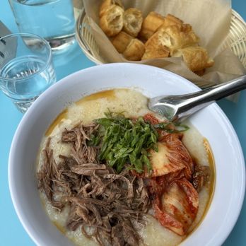 Secret Congee - Slow-Cooked Beef and Kimchi Congee - Asian Fusion Near Me - Seattle, Washington Secret Congee - Slow-Cooked Beef and Kimchi Congee - Asian Fusion Near Me - Seattle, Washington
