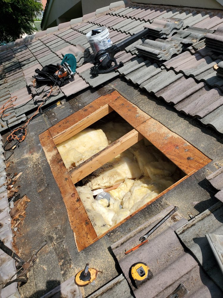 Slide of Rip Tide Roofing